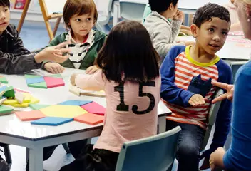 Children building communication and language skills through interactive learning experiences