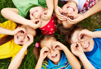 Children exploring their surroundings through learning activities at a nursery in Dubai